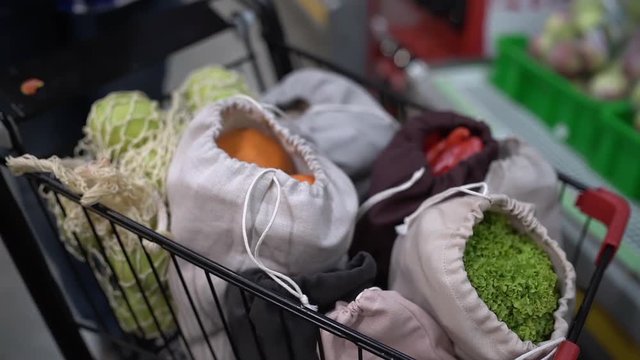 cart with natural products in eco zero waste bags