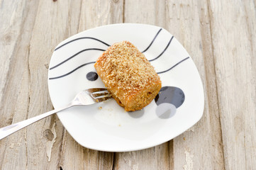 oriental turkish food, sweet rolled pastry with walnuts