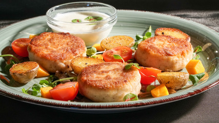 Fish patties with a side dish