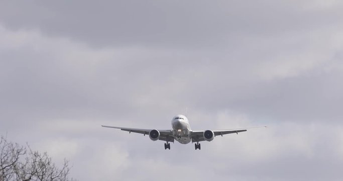 Airplane flying low during approach at London Heathrow airport