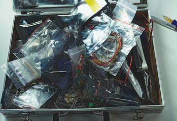 Top view of different computer instruments in box
