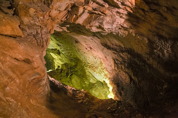 The beautiful stalactites and stalagmites and other rock formations are reflected in a small lake in the Antro del Monte Corchia cave in the Apuan Alps in Italy.