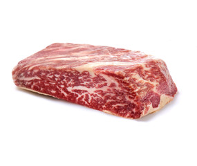 Raw marbled beef on a a white background