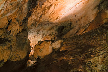 The beautiful stalactites and stalagmites and other rock formations are reflected in a small lake in the Antro del Monte Corchia cave in the Apuan Alps in Italy.