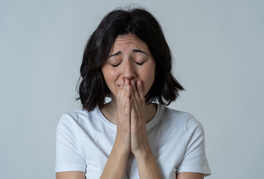 Portrait Of A Young Attractive Woman Looking Scared And Shocked.Human Expressions And Emotions