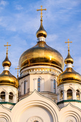 Fototapeta na wymiar Orthodox cathedral domes and golden crosses