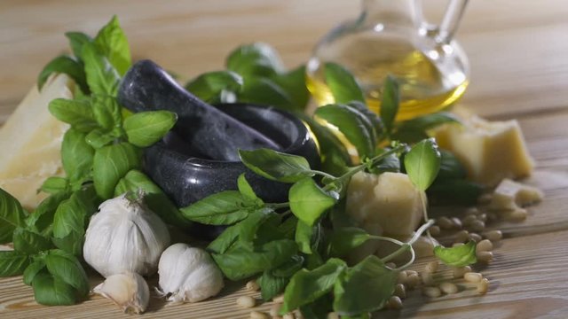 Genoise pesto sauce and ingredients on the wooden table