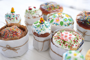 Easter cakes on a white wooden background