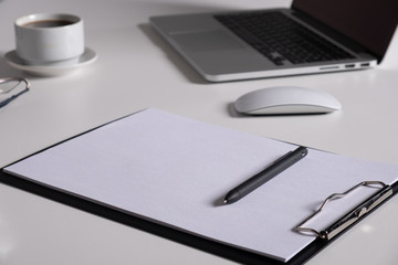 Laptop, notebook Tablet and cup of coffee on work desk