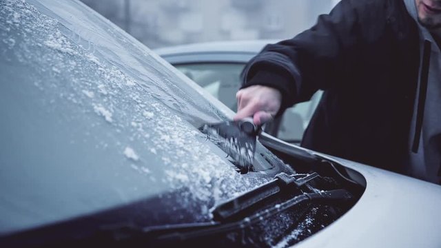 Cold winter ice on car windshield