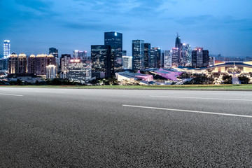 Road and skyline of urban architecture..