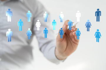 teamwork - Stack of hands showing unity and teamwork .