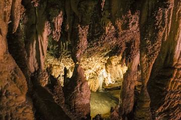 The beautiful stalactites and stalagmites and other rock formations are reflected in a small lake in the Antro del Monte Corchia cave in the Apuan Alps in Italy.