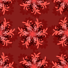 a dark red background with a floral ornament of different red colors