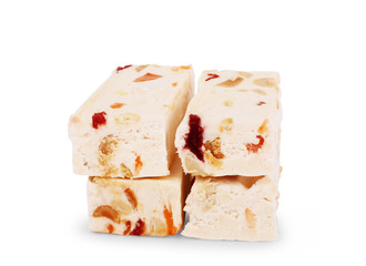 French soft nougat with strawberry flawour and almonds isolated on white background. Greek manolato