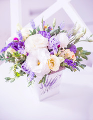 Delicate spring bouquet on a light background.