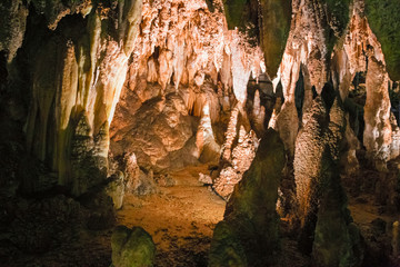 The beautiful stalactites and stalagmites and other rock formations are reflected in a small lake in the Antro del Monte Corchia cave in the Apuan Alps in Italy.