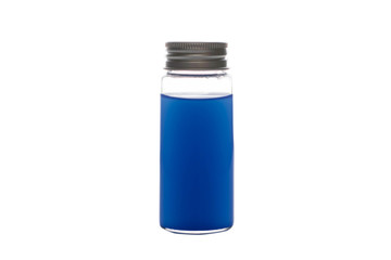 Glass jar with colored liquid on a white background, isolate