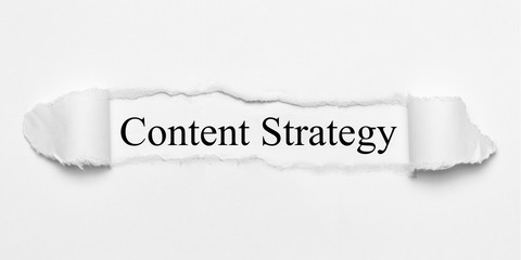 Content Strategy on white torn paper