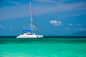 Small yacht  in the sea with blue sky