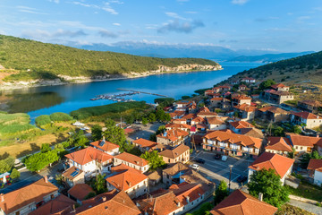 Fototapeta na wymiar aerial view of the beautiful fishing village Psarades in Prespa lake in Northern Greece