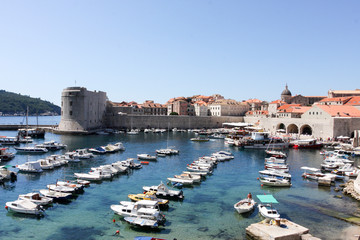 Fototapeta na wymiar Boats in the port of an old town. Croatia, Dubrovnik.