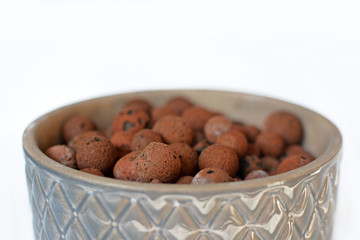 Expanded clay pellets for keeping plants in semi Hydroponics in a pot