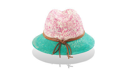 Pretty straw hat with ribbon and bow on white background. Beach hat top view isolated