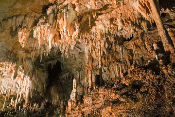 The beautiful stalactites and stalagmites and other rock formations are reflected in a small lake in the Antro del Monte Corchia cave in the Apuan Alps in Italy.