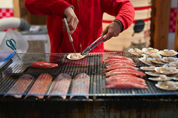 Closeup Street food Japan, Burning of seafood.