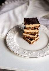 tasty chocolate authentic canadian dessert Nanaimo with nuts in healthy version - plant based and shugar free