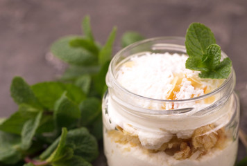 Coconut bisquit dessert with ricotta, mint. Yogurt breakfast