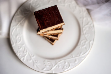 tasty chocolate authentic canadian dessert Nanaimo with nuts in healthy version - plant based and shugar free