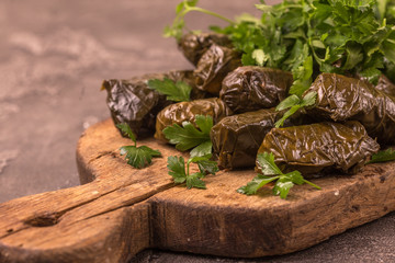 Traditional georgian cuisine. Dolma in grape leaves