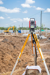 Surveyor equipment GPS system or theodolite outdoors at construction site.