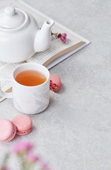 Relaxing tea, macaroons and book