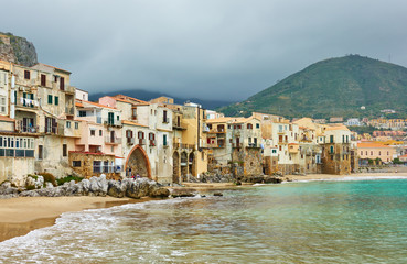 Fototapeta premium Houses by the sea in Cefalu