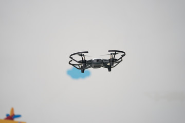 Small drone fly inside house room