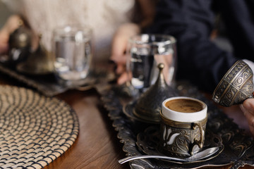 Turkish coffee in a beautiful traditional dishes
