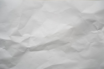 Crumpled white paper background texture