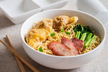 Egg noodle with wonton and red roasted pork, Asian food style