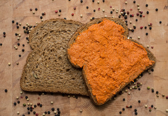 Brown Sandwich with Filet americain on wood, American fillet, Cow meat and pepper