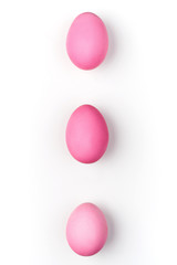 Easter holiday symbols pink eggs vertical background white 