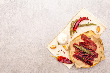 Basturma, dried tenderloin of beef meat, jerky, thinly sliced. Dry rosemary, pepper mix, chili,...