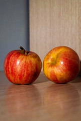 apples on wooden table