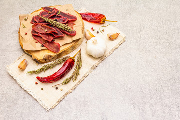 Basturma, dried tenderloin of beef meat, jerky, thinly sliced. Dry rosemary, pepper mix, chili,...