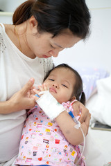 Mom is take care her baby