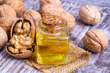 Cosmetic and therapeutic walnut oil. Food and cosmetic concept photo.