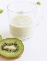 Fototapeta na wymiar Healthy fresh kiwi smoothie with fresh fruits isolated on white background. Superfood, detox and healthy food.