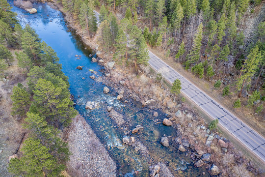 aerial view of mountain river at sunset